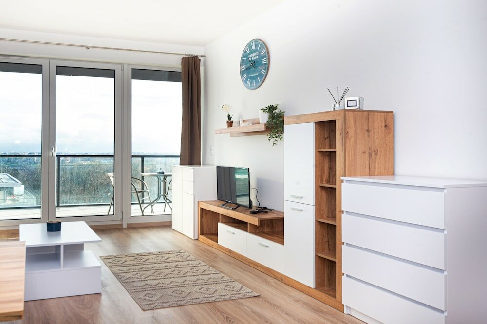 Фото WaterFront City Apartments by UrbanRent