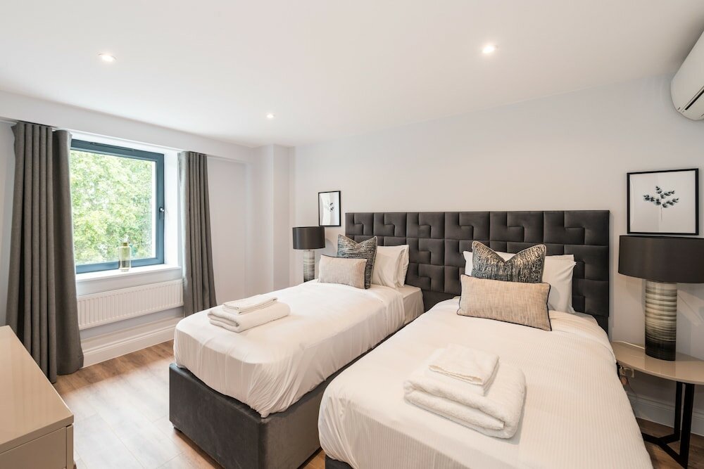 Фото The Carlyle - Elegant Serviced Apartments