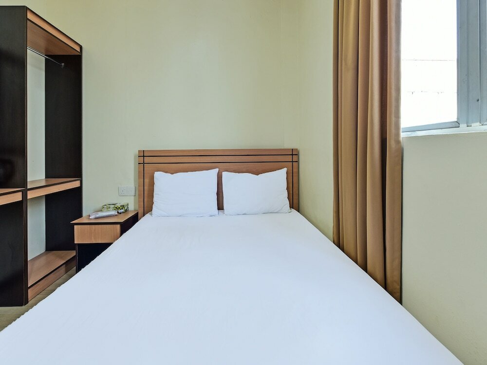 Фото Spot On 91336 Guesthouse Tarumanegara