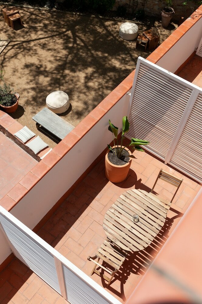 Фото Hostal Es Niu de Tamariu