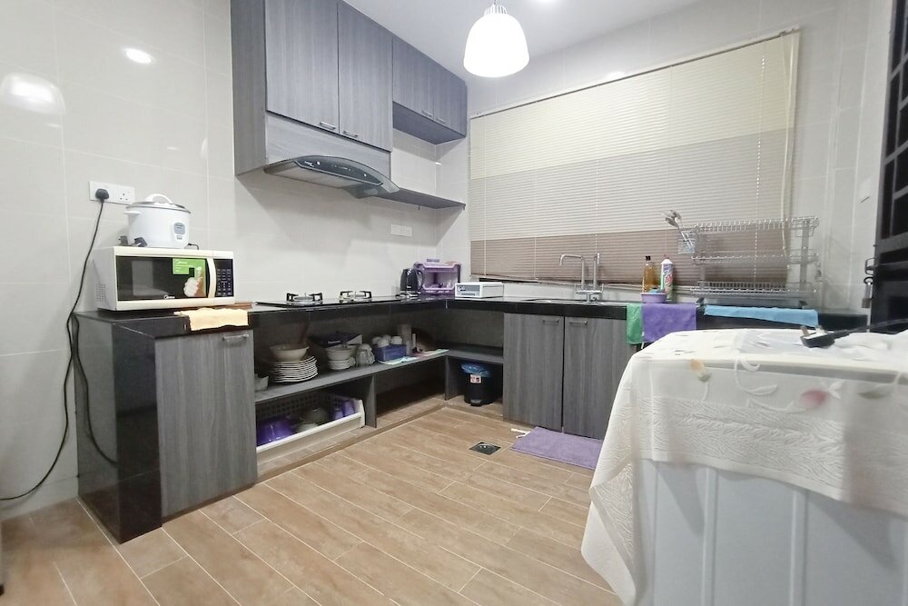 Фото Oyo 90203 Emma Sukma Homestay