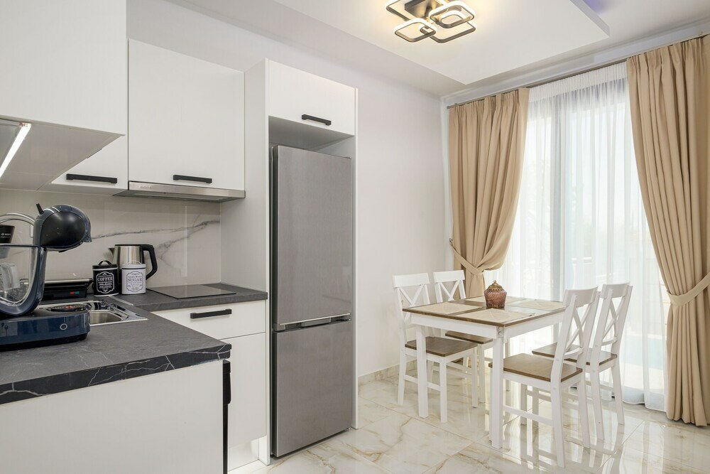 Фото Luxury maisonettes Vrachos with pool