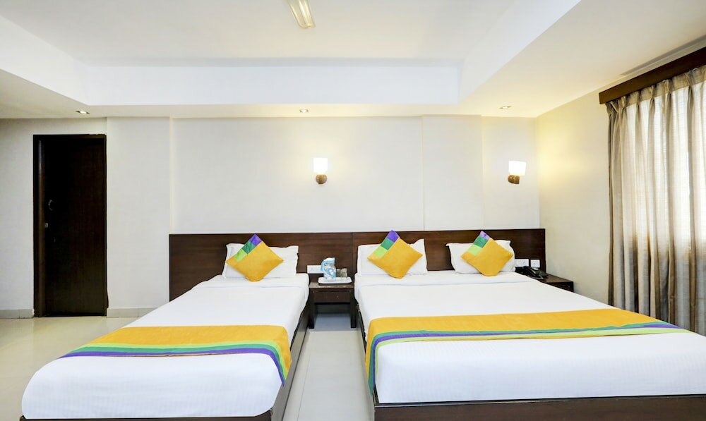 Фото Itsy by Treebo - Greenwood Inn And Suites