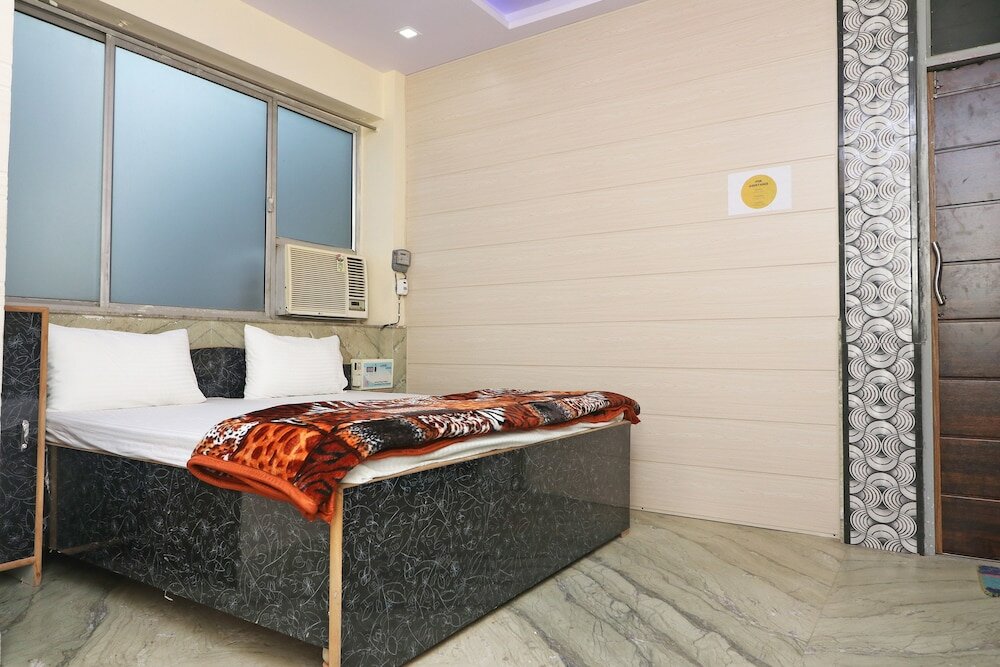 Фото Spot On 43881 New Era Guest House