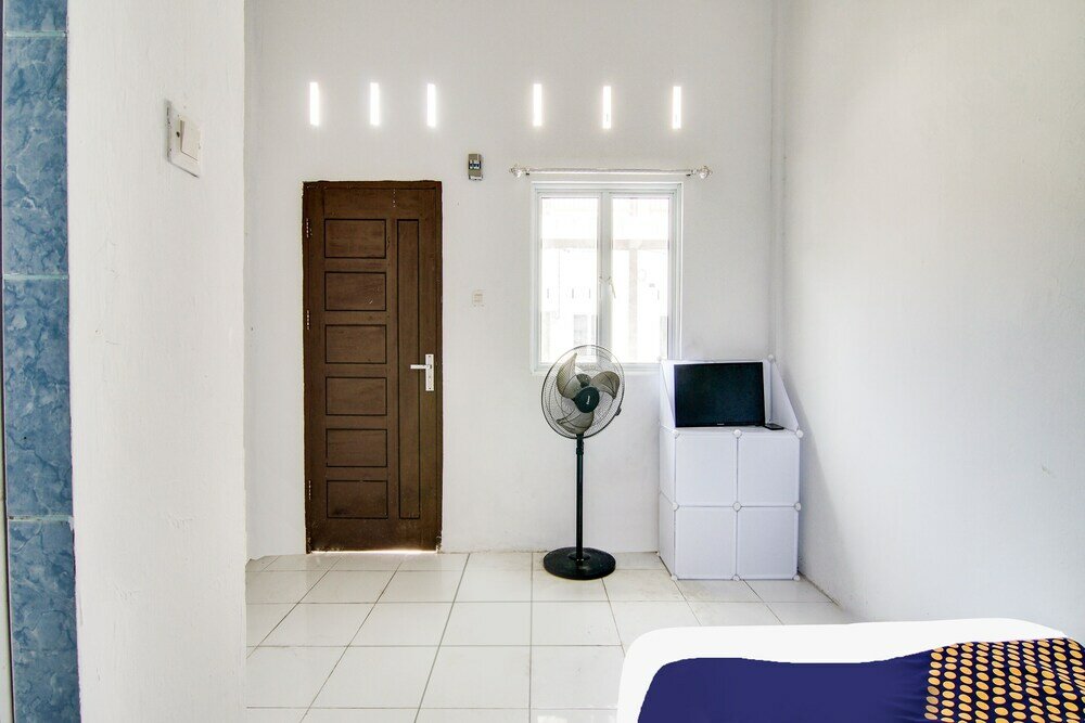 Фото Spot On 91858 Raja Homestay Syariah