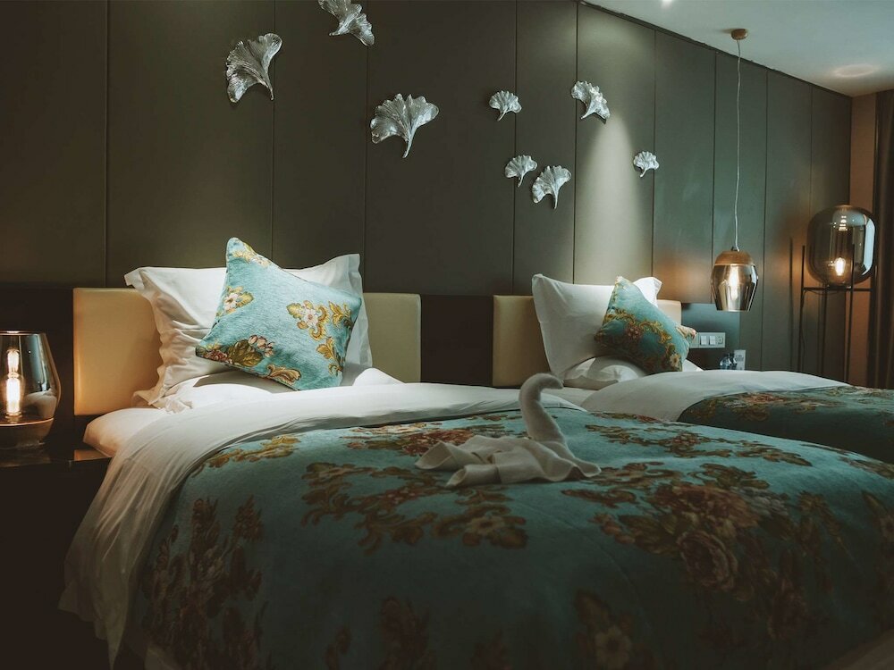 Фото Tulip Inn Huaxi Hotel - Guiyang