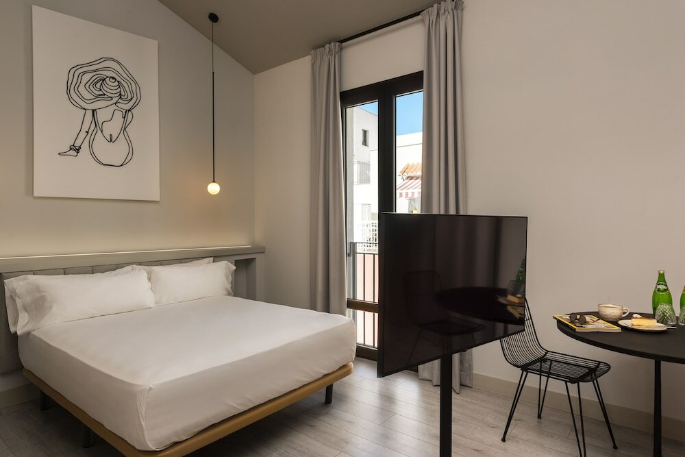 Фото Coeo ApartHotel Parras