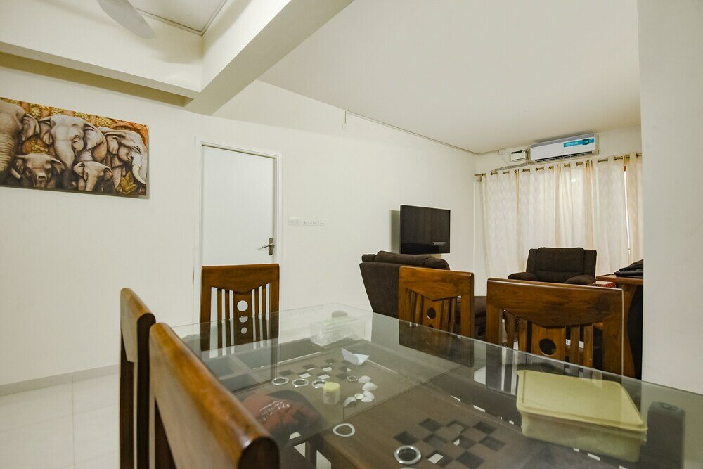 Фото Fabhotel Prime Santoshi Holiday Homes