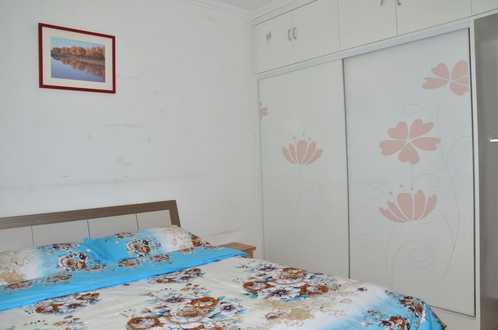 Фото Lanzhou Longshang Mingzhu Apartment Two-bedroom suite