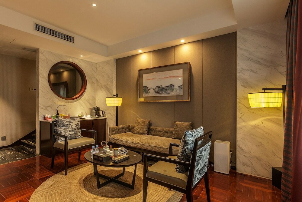 Фото Hejing Chengshang Generations Hotel