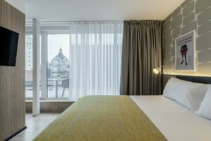 Гостиница Premier Suites Plus Antwerp