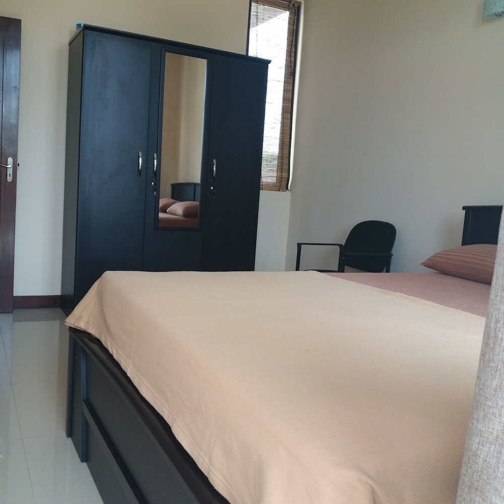 Фото Tj's Apartments