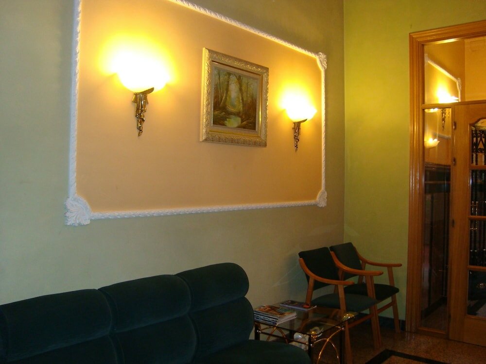 Фото Hostal Universal