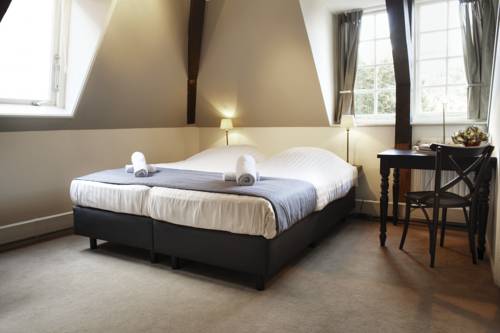 Фото Hotel aan de Dam