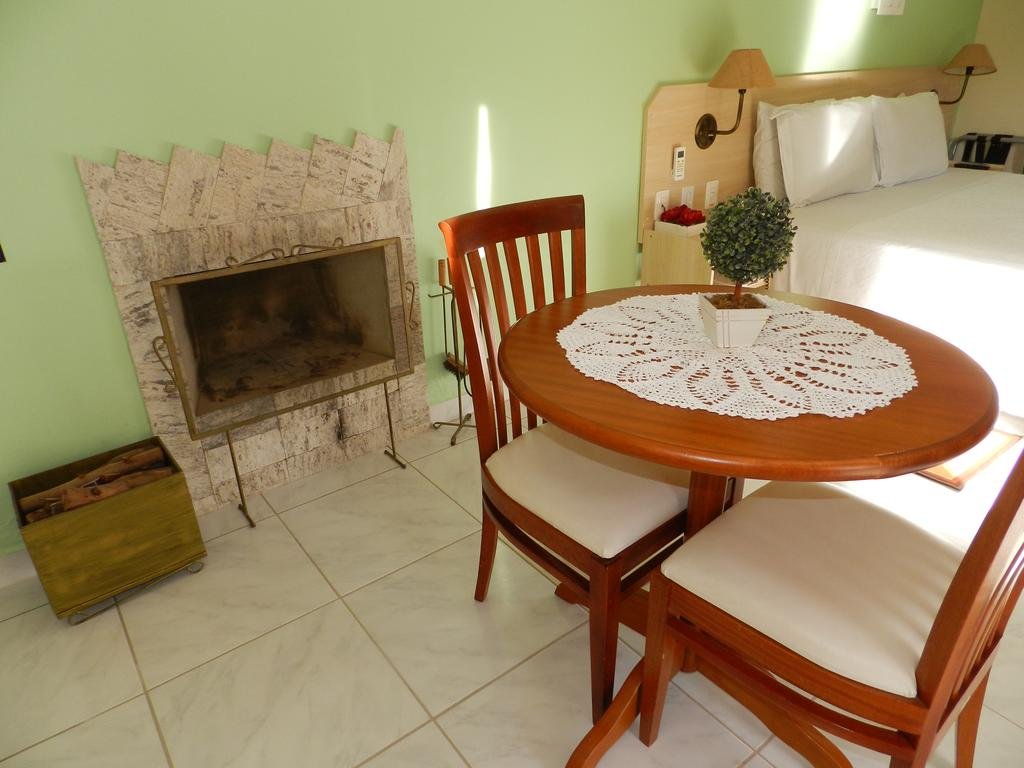 Фото O Recanto Pousada