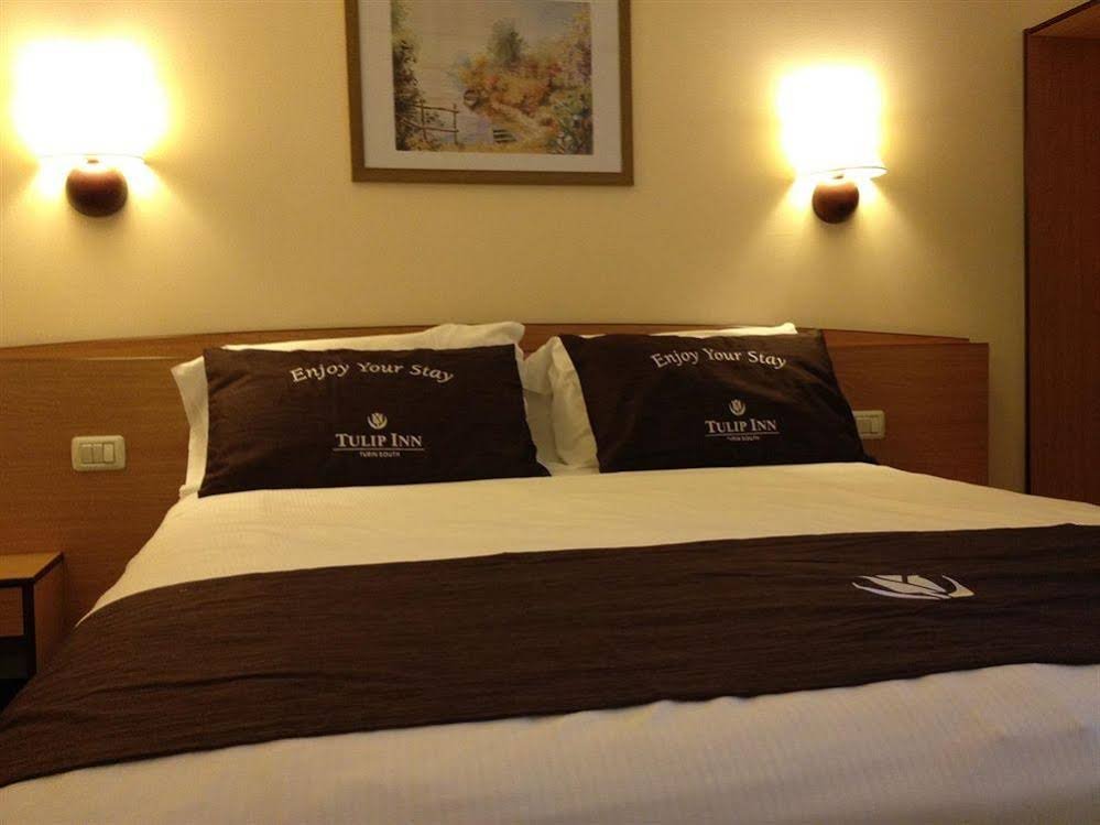 Фото Tulip Inn Padova