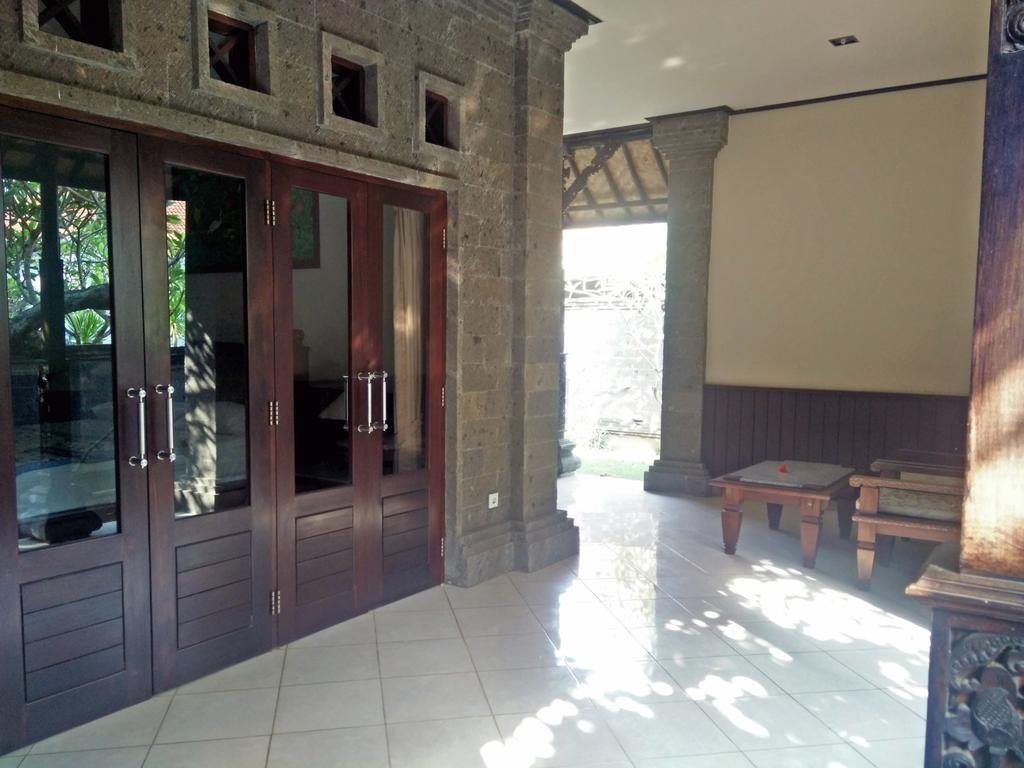 Фото Puri Rai Hotel