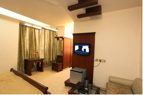 Фото Treebo Shanta Inn