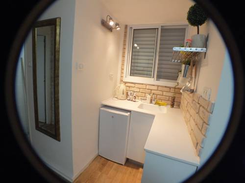 Фото Downs Corner Apartment