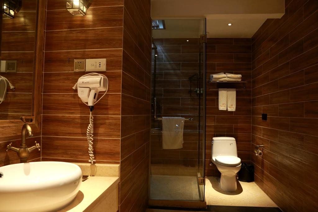 Фото Chengdu Chuanjia Heyuan Theme Hotel