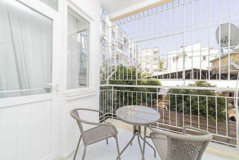 Апартаменты Cozy Flat w Balcony 10 min to Mermerli Beach в Муратпаше