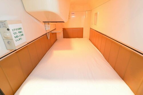 Гостиница Capsule Inn Shimbashi - Men Only в Токио