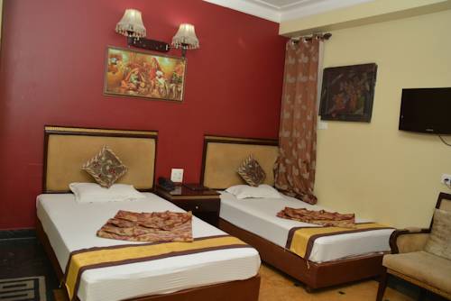 Фото Revels Plum Hotel