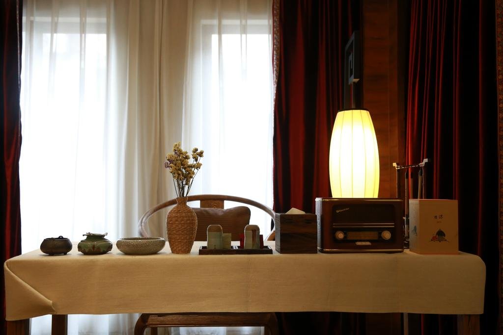 Фото Chengdu Chuanjia Heyuan Theme Hotel