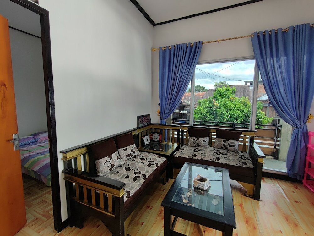 Фото Oyo 92357 Zzip Homestay