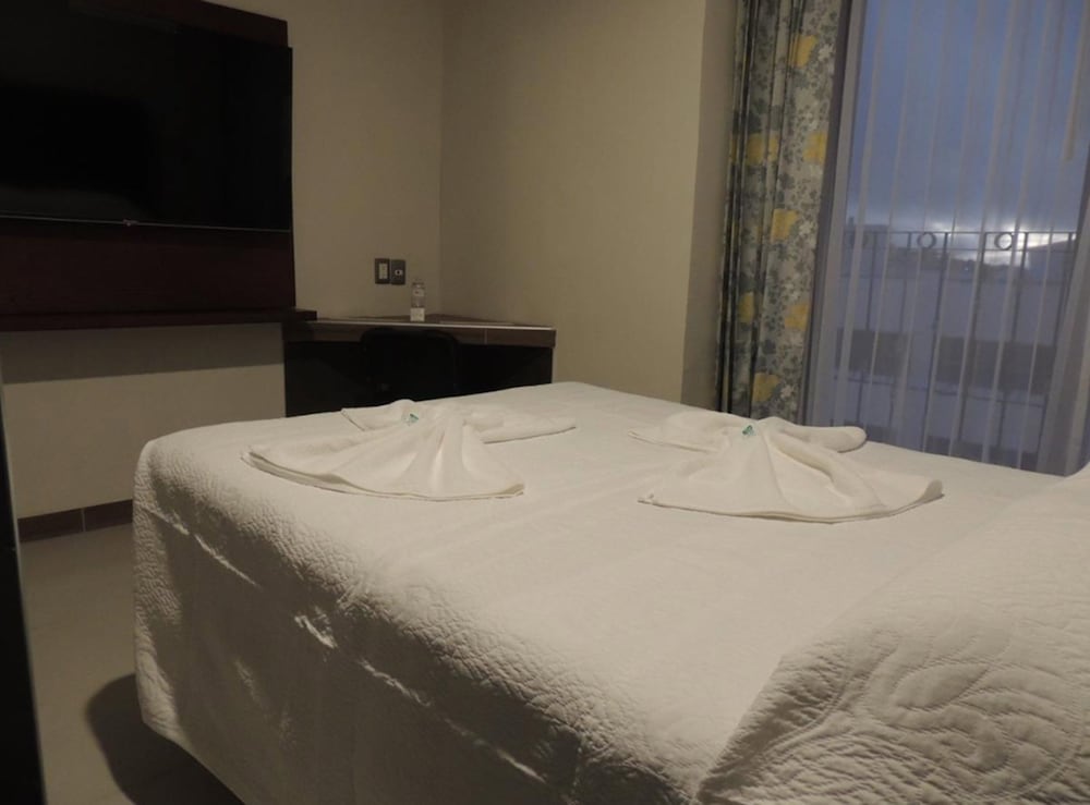 Фото Hotel Garden Plaza