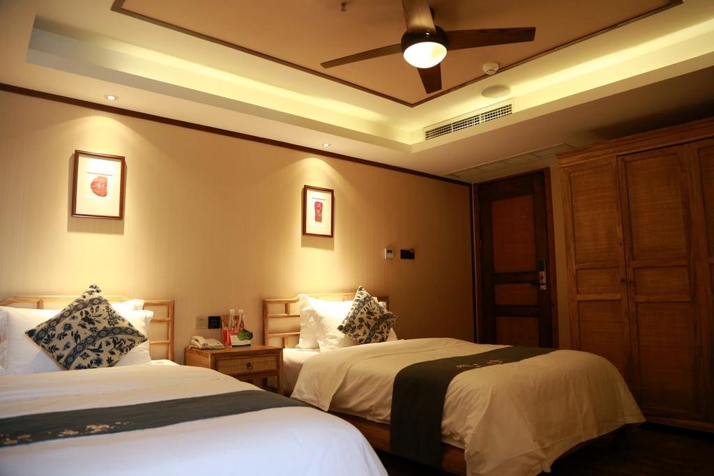 Фото Chengdu Chuanjia Heyuan Theme Hotel