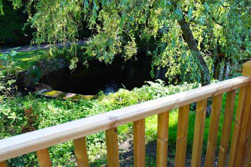 Фото Auchendennan Luxury Self Catering Cottages