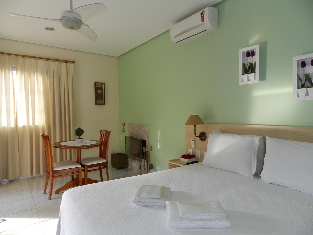 Фото O Recanto Pousada