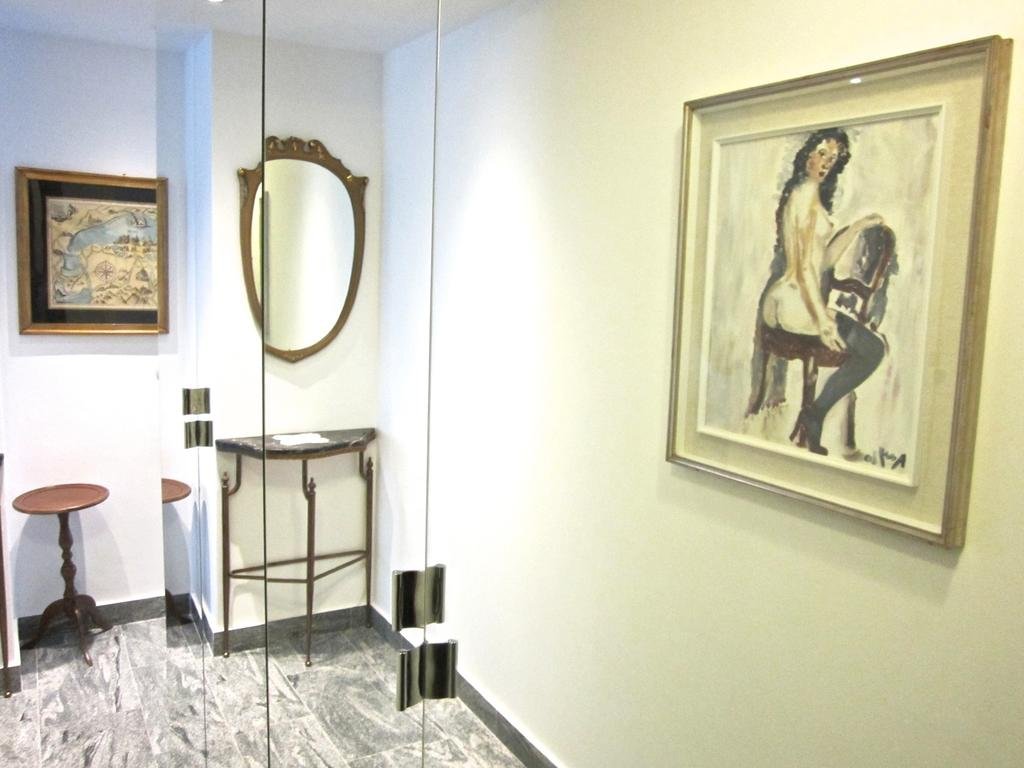 Фото Aiello Suites Executive