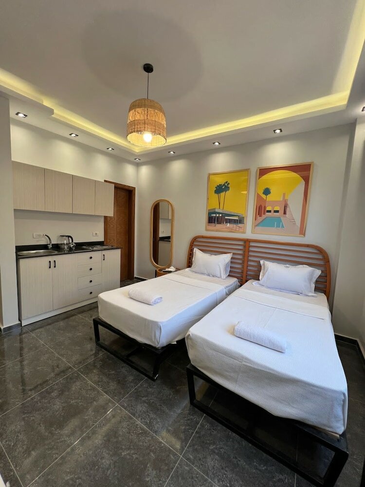 Фото Travelholic Auc Residence