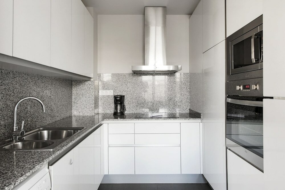 Фото The Corner Apartments by Aspasios