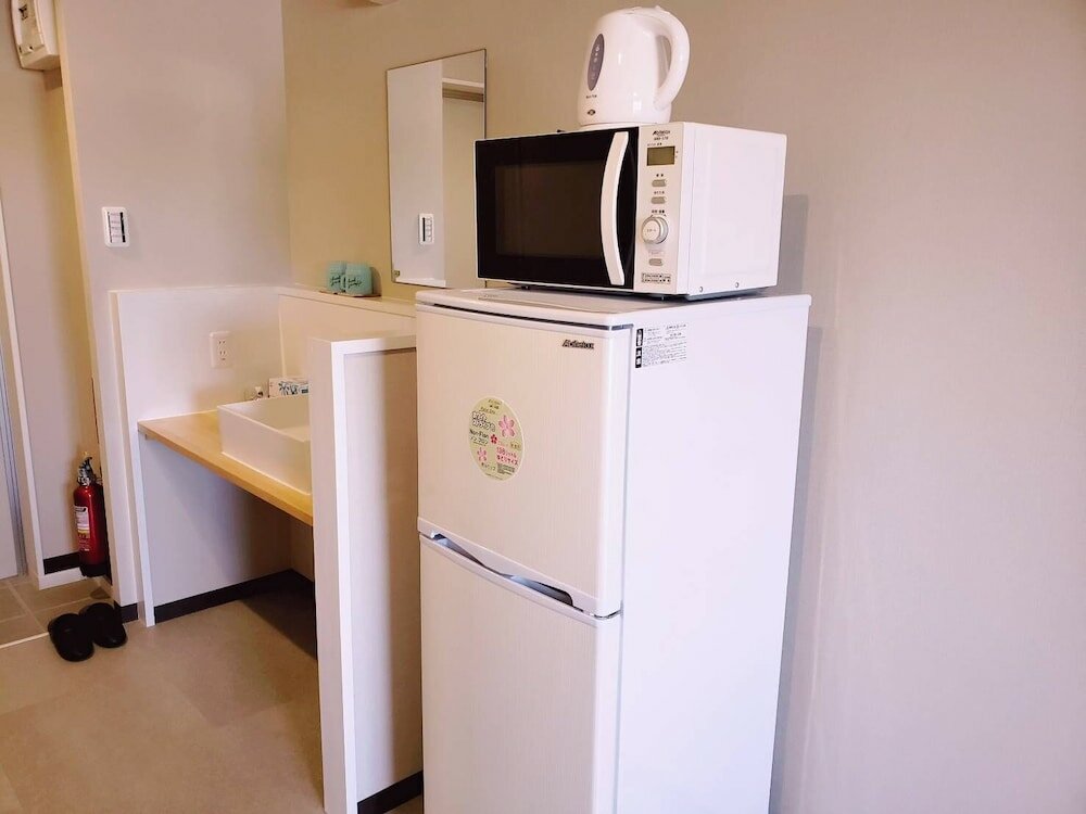 Фото Mr. Kinjo Happiness Resort 1