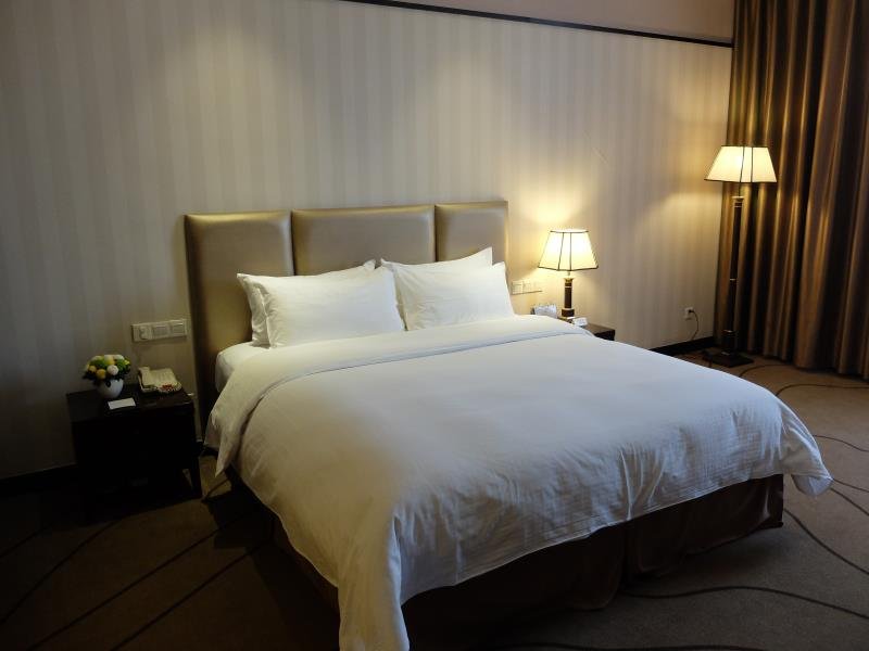 Фото Yashidu Suites Hotel