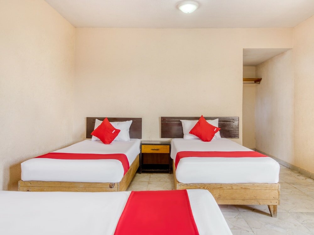 Фото Capital O Hotel La Siesta, Gómez Palacio