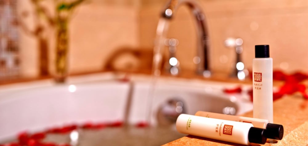 Фото Grand New Century Hotel Binhai Tianjin