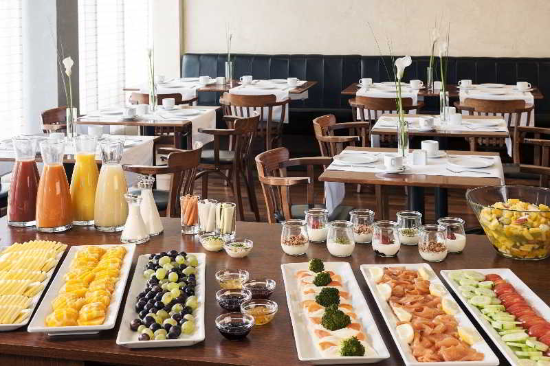 Фото Nh Fribourg Hotel