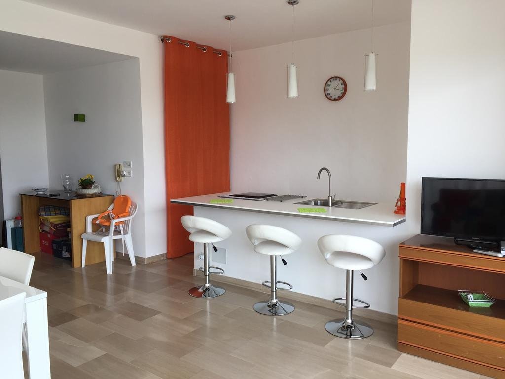 Фото La terrazza sul porto