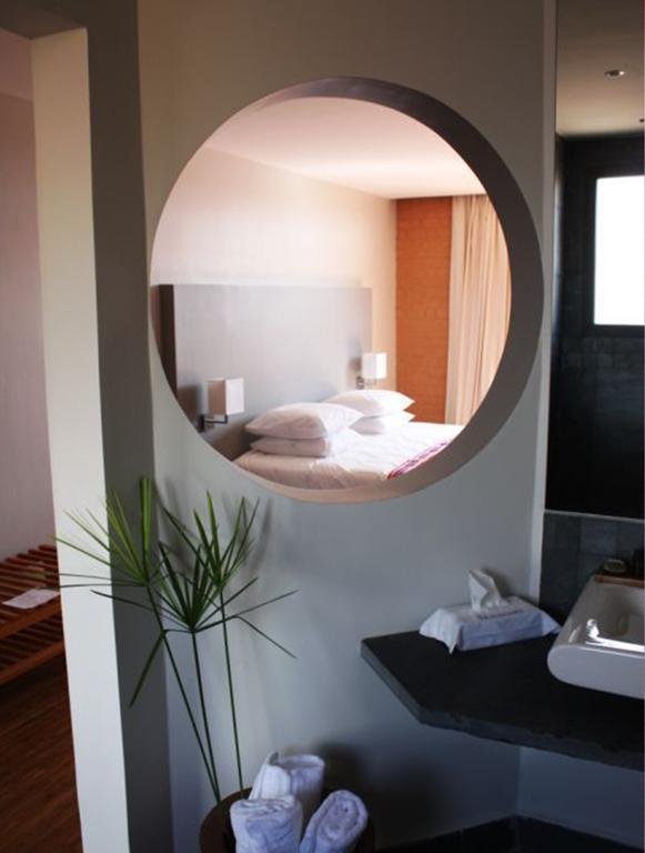 Фото Tamboho Hotel