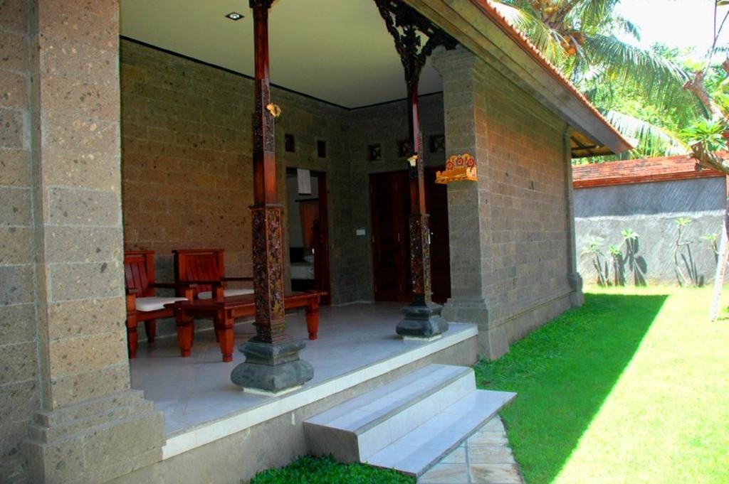 Фото Puri Rai Hotel