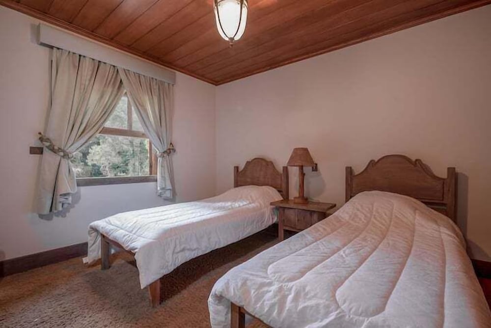 Фото Aconchegante Mansão em Campos do Jordão