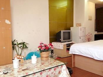 Фото Yuelai Apartment Hotel