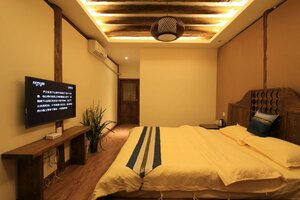 Village Green Inn (Yunnan Province, City of Lijiang, Gucheng District), hotel