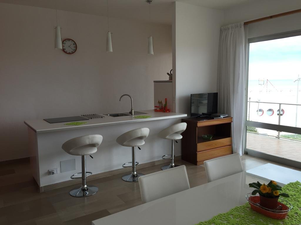 Фото La terrazza sul porto