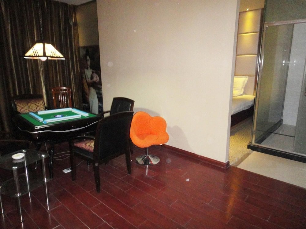 Фото Linhai Aishang Business Hotel