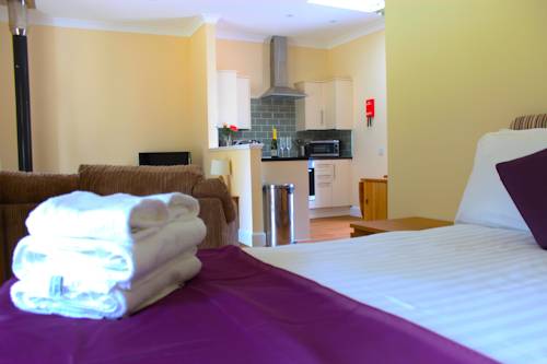 Фото Auchendennan Luxury Self Catering Cottages